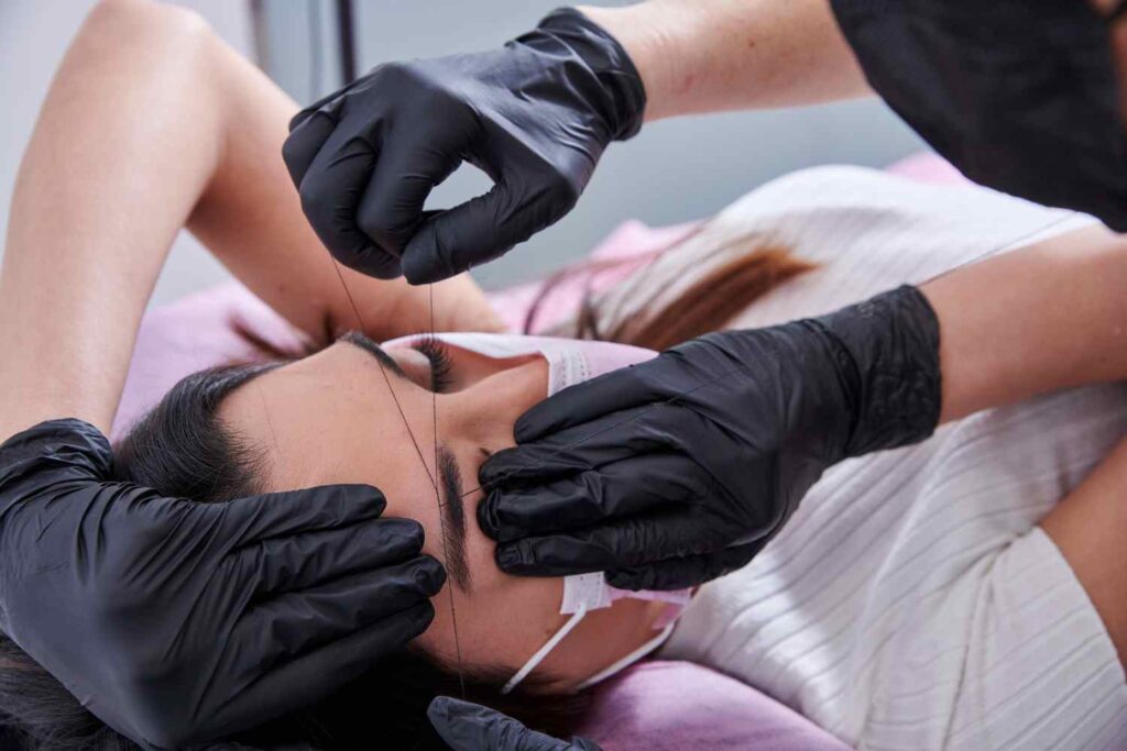 face threading, hair removal