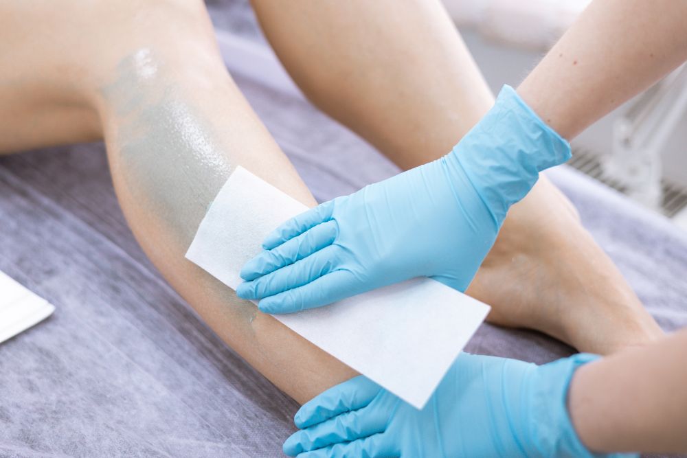 Women with smooth skin can benefit from professional waxing treatments.