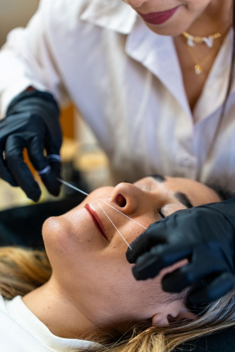 Professional eyebrow threading for clean and defined brows in Downtown Manhattan.